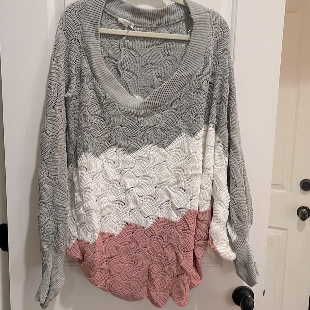 Off the shoulder boutique sweater in like new condition